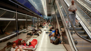 With missiles overhead, Tel Aviv residents huddle underground