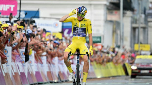 Vollering wins Tour de France Femmes after war of nerves