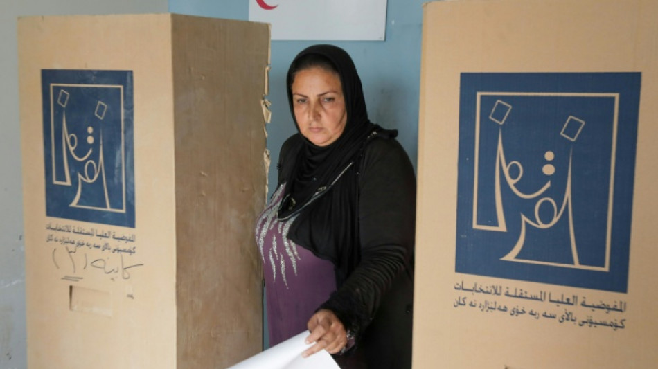 Iraqis vote in general election in rare moment of calm