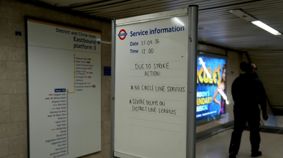 Thousands of London commuters walk to work in underground strike