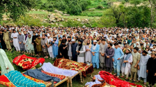 Pakistan rescuers recover bodies after monsoon rains kill 320