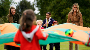 All smiles as Melania and Kate meet kids in first public event