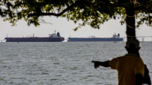 Asian markets track Wall St lower as AI fears mount