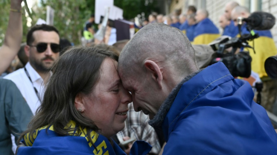 'Seventh heaven': Tears and laughter as Ukrainian POWs return