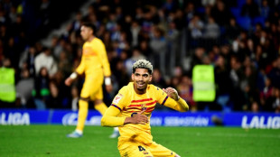 Bar&ccedil;a vence Real Sociedad nos acr&eacute;scimos e &eacute; terceiro no Espanhol; Girona lidera 