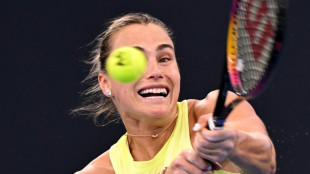 Australian Open title rivals ease through in Brisbane warm-up