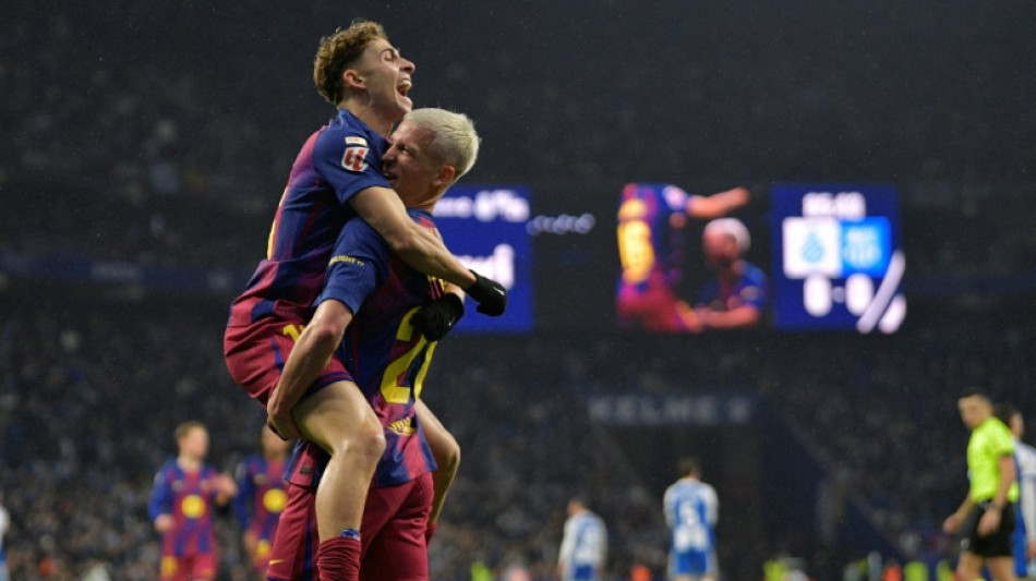 Olmo, Lewandowski grab Barca late victory in Espanyol derby clash